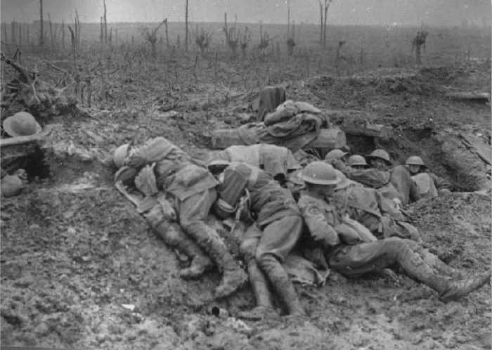 This photo shows if nothing else a soldier curled up clasping his ears in an attempt to take the noise away... usually only death could do that.