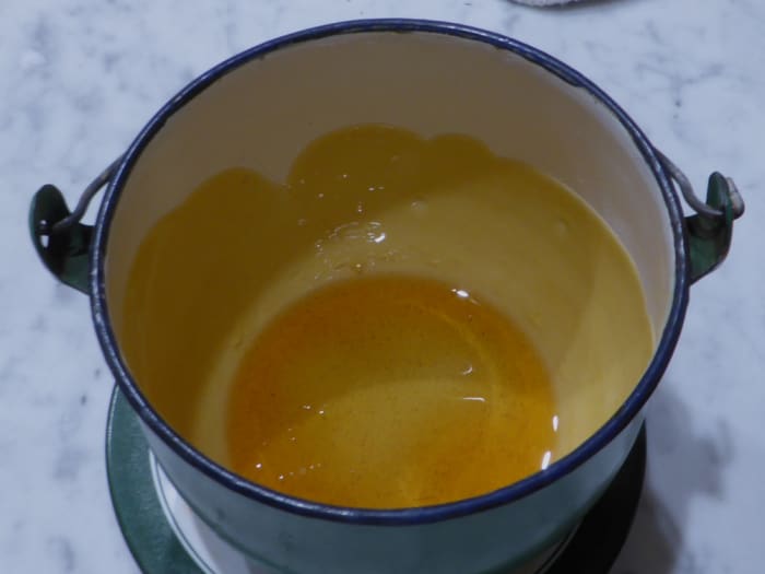 Make the caramel and set aside to cool. I have swirled the caramel around the pot in which the kaya is to be cooked. Image: © Siu Ling Hui