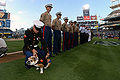US Navy Marine fixes uniform on the Marine corps bulldog mascot