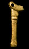 This gold tubular decorative ornament with shaped knob is folded from three sheets of gold foil, the sheets overlapping on the edges and held in place with rows of gold nails