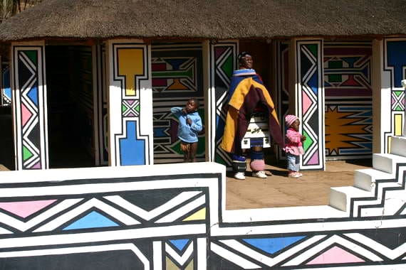 Among the Nuni/Bakone people, the Ndebeles distinguish themselves from other by specializing in their attire and with sparkling colors used in their geometric art design on the home walls