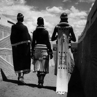 The Nebele wore a long train with he bridal costume called "Nyoga", which meant snake. It was attached to her shoulders and trailed down the back to the ground, making a snake-like motion as she danced