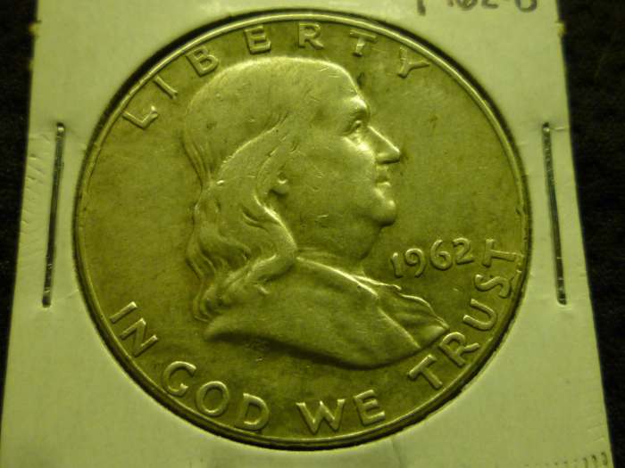 Circulated 1962 Franklin Half Dollar. This coin as with most circulated Franklin Half Dollars is worth the melt value of $14.60