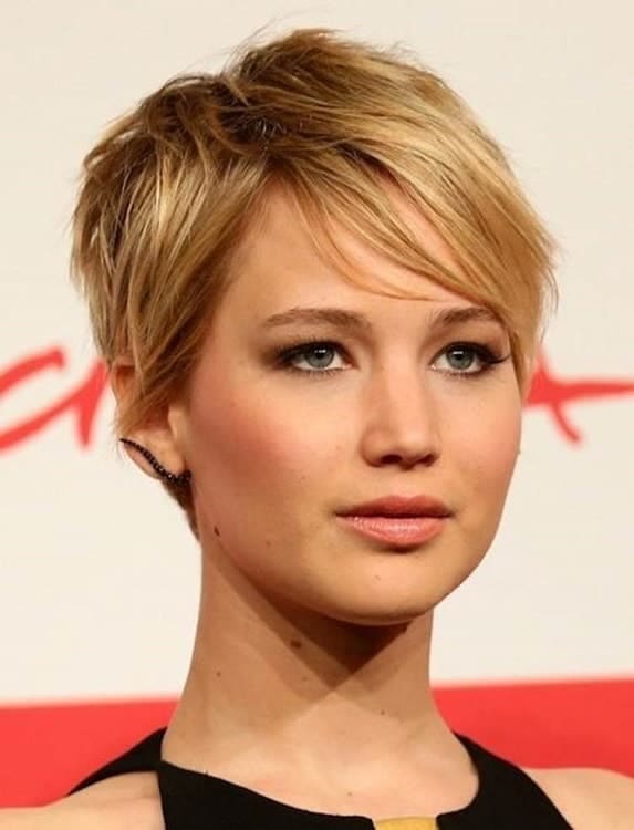 This longer pixie is great for round faces. Notice that the top is slightly higher to elongate the face. The layers and length of the hair add more depth.