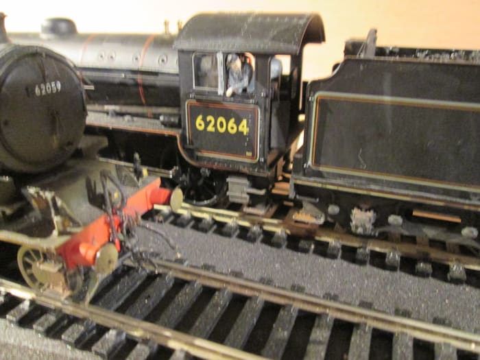 Two of my own - so far - Hornby Class K1's, 62064 of Stockton-on-Tees (51E) in the mid-1950s and 62059 (Darlington 51A) nudging into the picture, left. Some weathering makes a model look real, with Jackson screw couplings and cast brass vac pipes