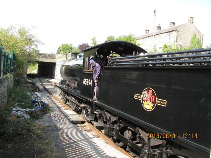 And we're off, west to Redmire with fireman Pete James taking a rest to let cleaner Tom Noble shovel the black stuff