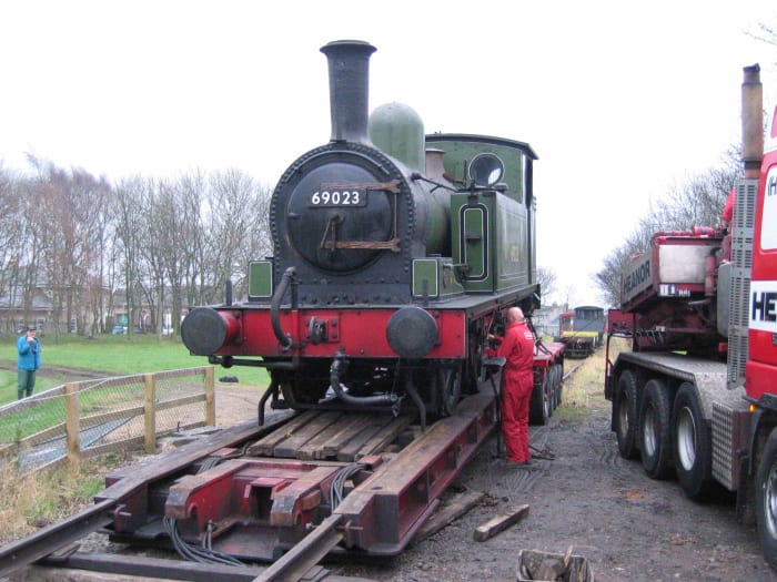 Class J72 0-6-0 tank locomotive arrives at Hopetown, Darlington on a low loader for overhaul, mid December, 2004 (R Pearson)
