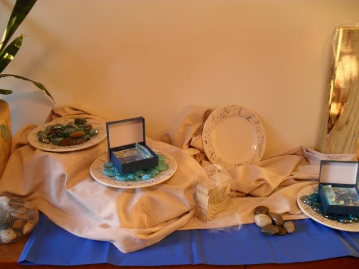 By purchasing items with a related theme, "Adrift", and related color scheme, I put together a display for my home jewelry parties for under $30. Shopping in the bargain bins and second hand stores, I kept my eyes peeled for things that would work in