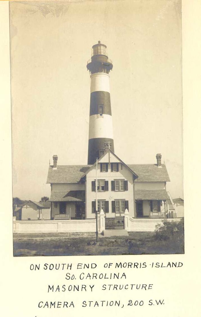 What the Lighthouse looked like in 1914 before erosion. Many families were raised , lived , died and were buried at the Morris Island Lighthouse.