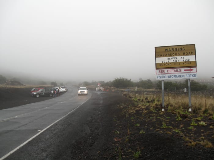 Warning of slippery and possibly icy road (in August) going up summit of Mauna Kea