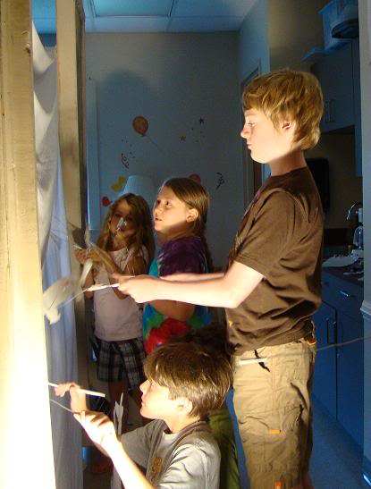 The kids in our homeschool co-op rehearsed their shadow puppet play for several days prior to putting it on during the end-of-the-year program.