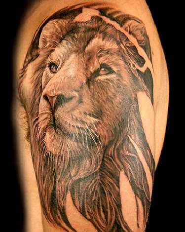 I find this tattoo calming. The lion seems wise and reminds me of Aslan from "The Lion, The Witch And The Wardrobe".