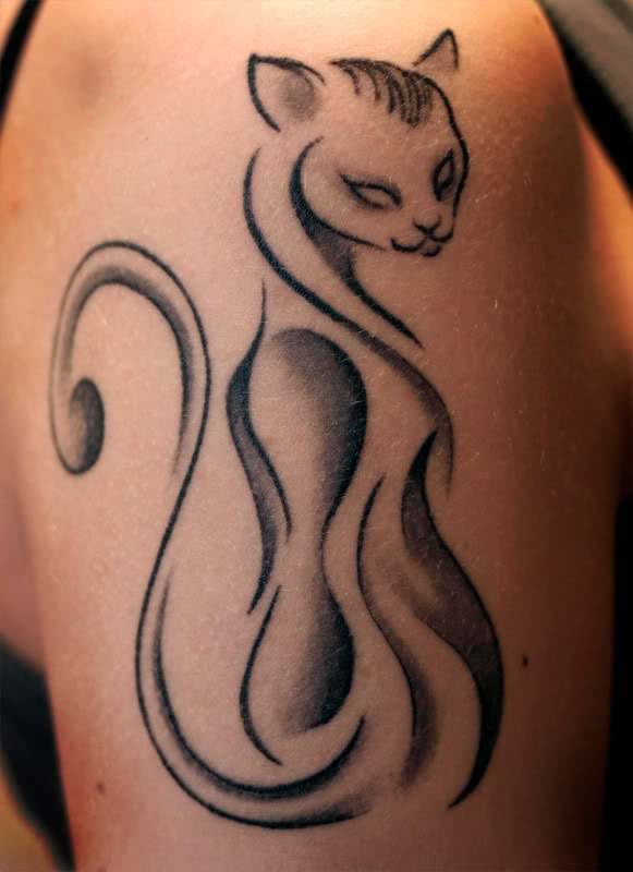 The simplicity and lean lines makes this tattoo stand out. With those blank eyes, you know this cat is up to no good.