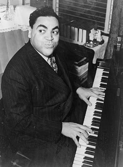 Fats Waller was known for his classic compositions and freed his left hand of the Harlem Stride Style from its rigid rhythmic structure, which allowed it to serve a more sophisticated and integrated part of the musical display.