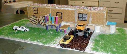 Ever hear that song "Lifestyles of the not so rich and famous, holes in all our socks, Ford Fairlane up on blocks?" Yep, this one reminds me of that song! The "Redneck" gingerbread house!
