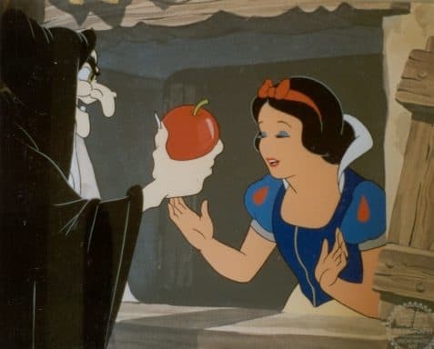 Snow White's evil step-mother is disguised as an old lady and hands her a poisoned apple to eat.