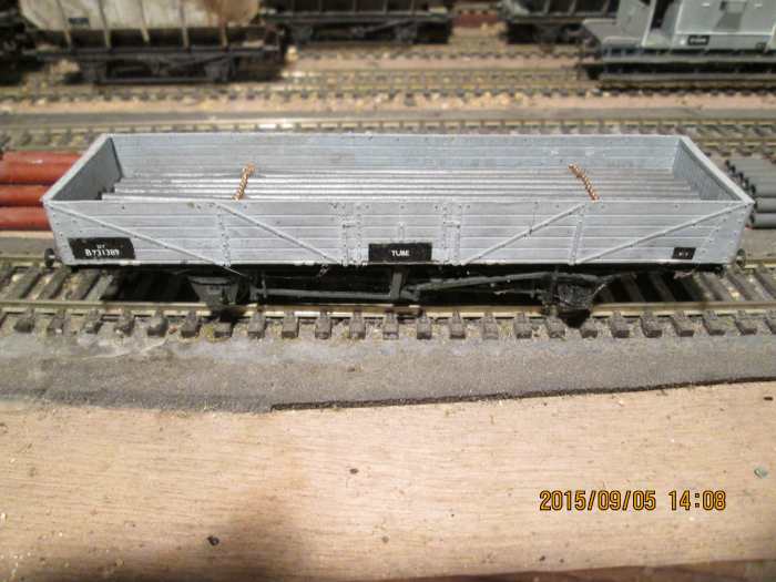 Another drop-sided, long wheelbase four-wheeled BR Tube Wagon - painted and chained 4mm aluminium tube load represents steel tube in this Parkside wagon (fine 2mm scale chain from Eileen's Emporium)