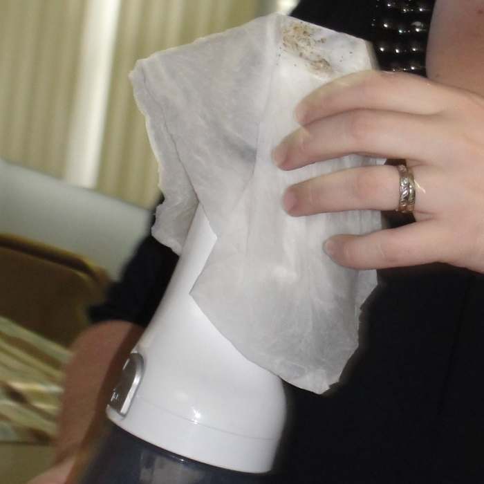 Using a vacuum cleaner and moist paper towel with glue to demonstrate how mucus helps our respiratory system