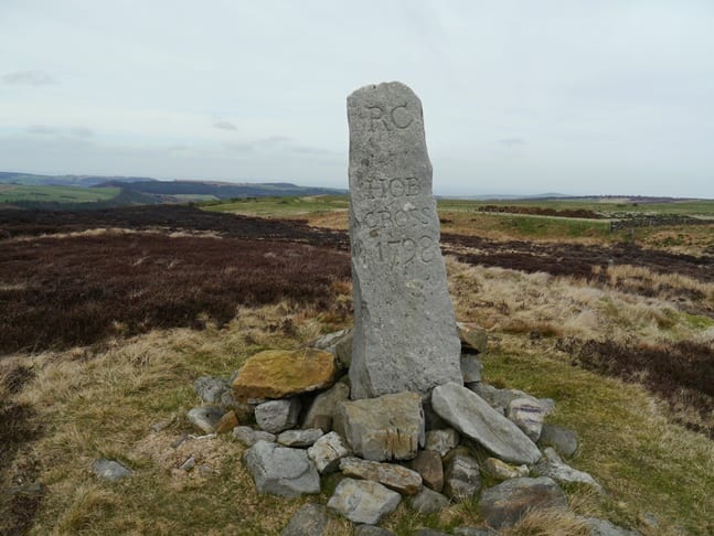 (A long way east of the Pennines), high on Commondale Moor, Hob Cross is your route marker. Come watch kestrels hover in their hunt for small animals in the heather and gorse roots