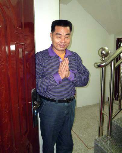 Mr.Xu Xian Li, who takes care of Swami’s Centre. His faith is so firm that he actually 'knocks' gently on Baba's door to let Him know that there are visitors coming!
