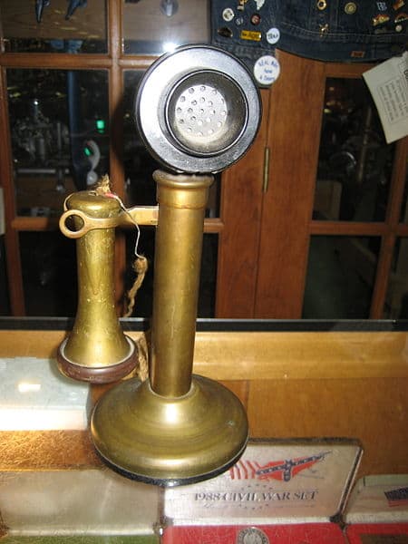 An old candlestick style telephone Permission is granted to copy, distribute and/or modify this document under the terms of the GNU Free Documentation License, Version 1.2 or any later version published by the Free Software Foundation