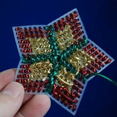 Here's a back view. As I worked up and down the "spokes", I hid any lengths of cord under my stitches.