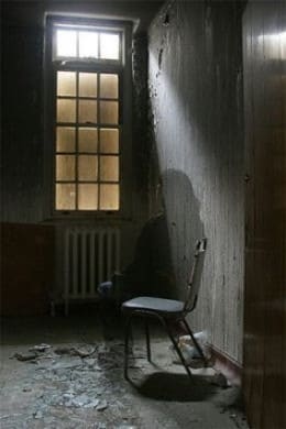 Here is a real photo we took of a ghost which we think is the ghost of a woman setting in a chair in the old closed down Unique Living Center that used to be near Fallston N.C.