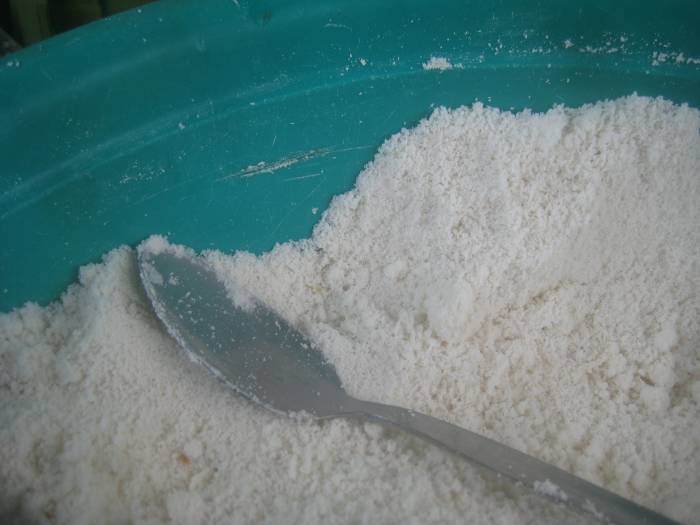 It is usually mixed with white sugar, small amount of salt (to enhance sweet taste) and little water to make it smooth,moist and easy to be molded.
