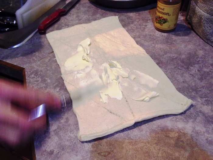 Step Three: Spread a good thick layer of butter across the entire top surface of your dough