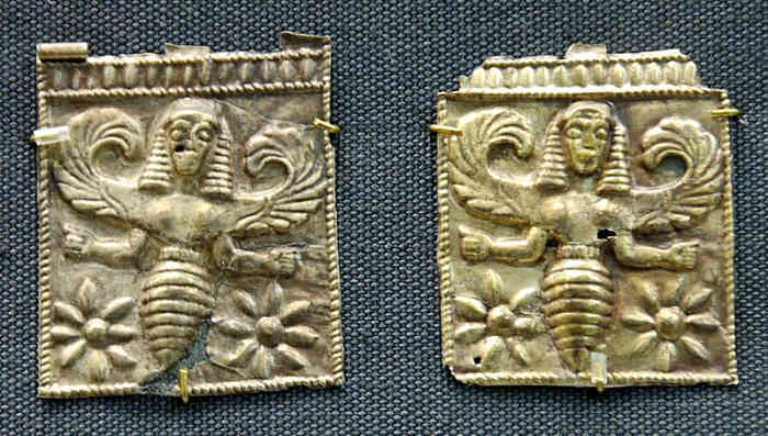 Bee-goddess, perhaps associated with Artemis above female heads. Gold plaques, 7th century BC; British Museum