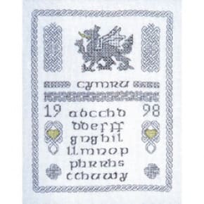 Ornate sampler depicting the Welsh dragon and masses of Celtic knots. With Welsh alphabet.