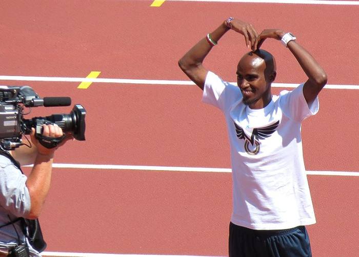 Mo Farah doing his "Mobot" signature pose at the London Anniversary Games, July 2013.