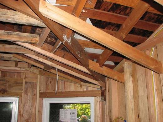 The roof of the house is tied straight to the timber frame; this type of roof may also need some steel rods that start from the concrete floor to tie down the roof frame down, this depends on the construction and the by laws of the local government
