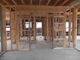 When building a brick veneer the timber frame of the house is the same as when a complete timber house is built, as the timber frame is supporting the roof and the bracing in the wall make it self sufficient.