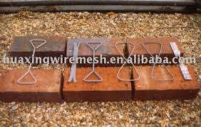 These are some type of cavity brick ties that would tie the two walls and leave a cavity between them.