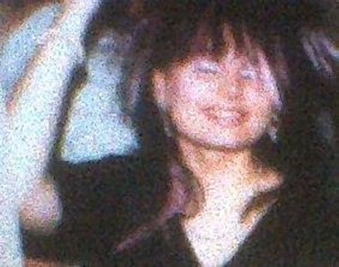 My friend Sandra had very long, dark hair and we ran some lilac hair extensions through it to add flashes of colour