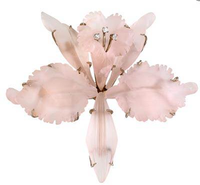 This vintage rose quartz brooch with white gold and 3 octagonal diamonds sold for 1603 Euros at auction. No, that's not chump change, but imagine what this piece would have cost with some other gemstone! Photo courtesy of Dorotheum.com