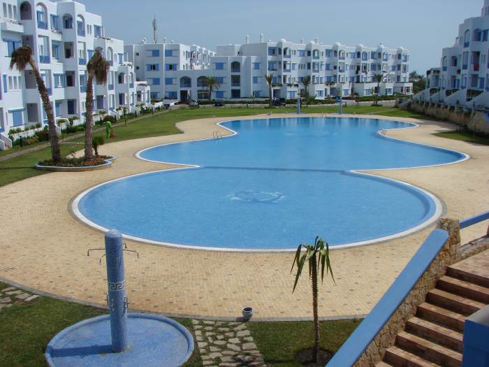 A purpose built apartment with a pool or beach view is a great place for a vacation