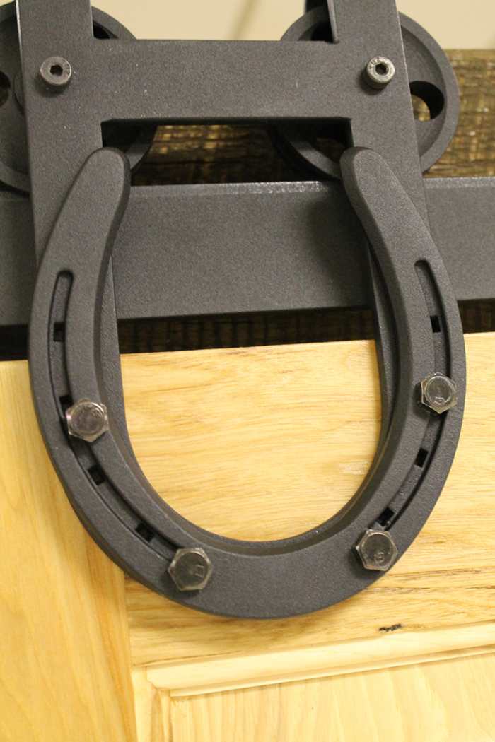 Enhanced Horseshoe Trolley equipped with decorative horseshoes are perfect for the rustic ranch style.