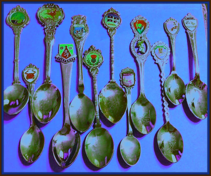Here is a mixed group of Souvenir Spoons with different themes, States, and countries. Many unusual travel locations and places are in this collection.