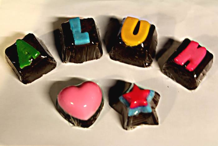 Signing out with chocolates decorated with my name. Bought by Wanna at a Bangkok night market and photographed by me
