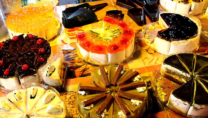 Flamboyantly decorated gateaux - common perhaps in a quality high street patisserie, but these were on a street stall in a night market