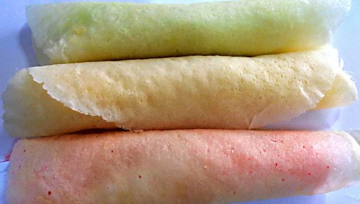 The finished 'roti saimai' - both the burrito-like roti and the candy floss filling - come in a range of colourings and flavourings