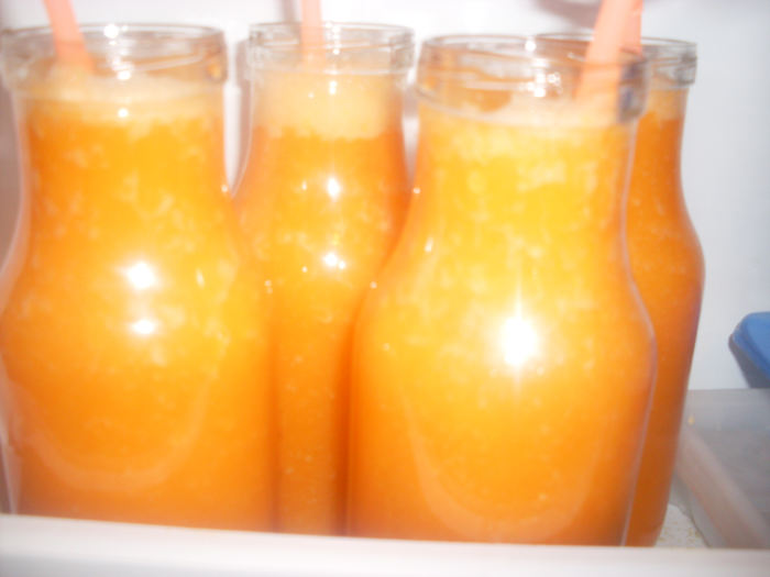 orange, peach, carrot smoothie. When all ingredients have been combined, this type of healthy smoothie has a very rich orange color. This healthy smoothie is delicious and looks very appealing too.