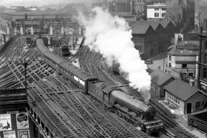 Newcastle-upon-Tyne, A1 2577 'Night Hawk' is seen from the Norman keep with a northbound express rattling over the (in)famous 'diamonds'