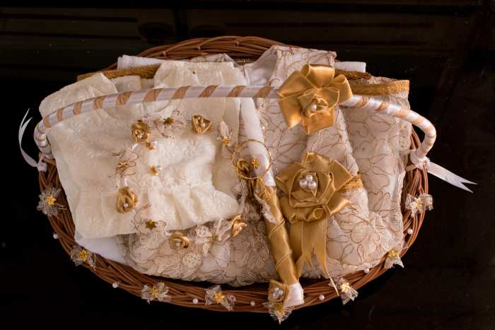 The Baptism Set, which I made for the Baptism of my younger daughter Annie. It contains, Baptism Gown, Crown, Candle and the First frock.