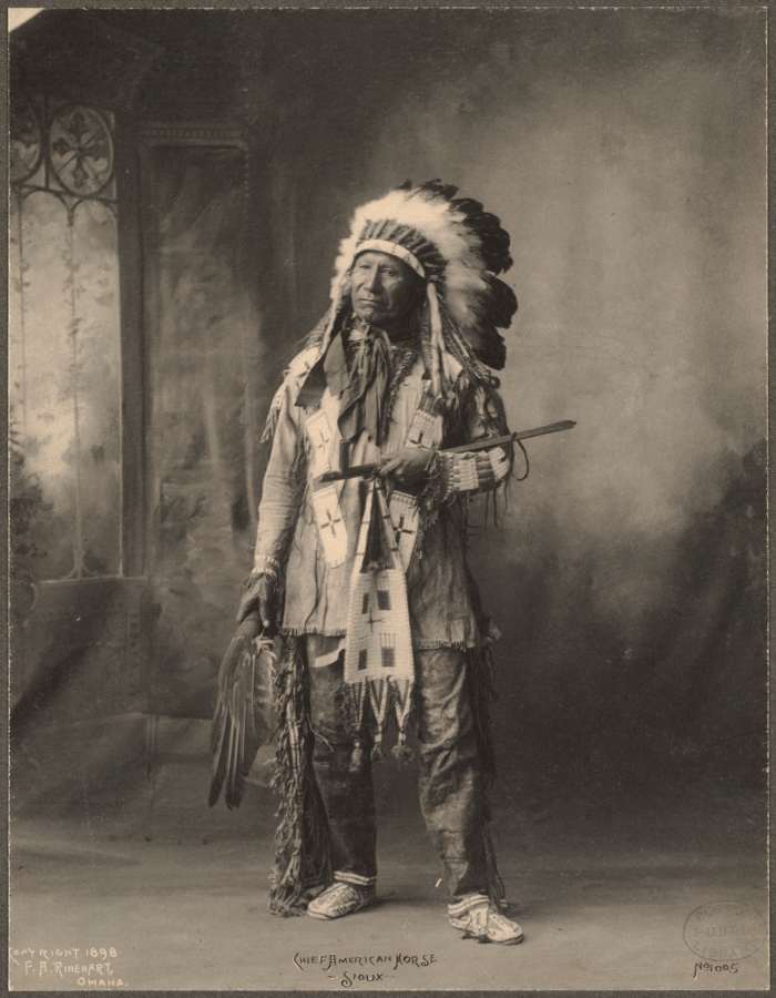 1898 - A Sioux Indian leader in traditional dress.
