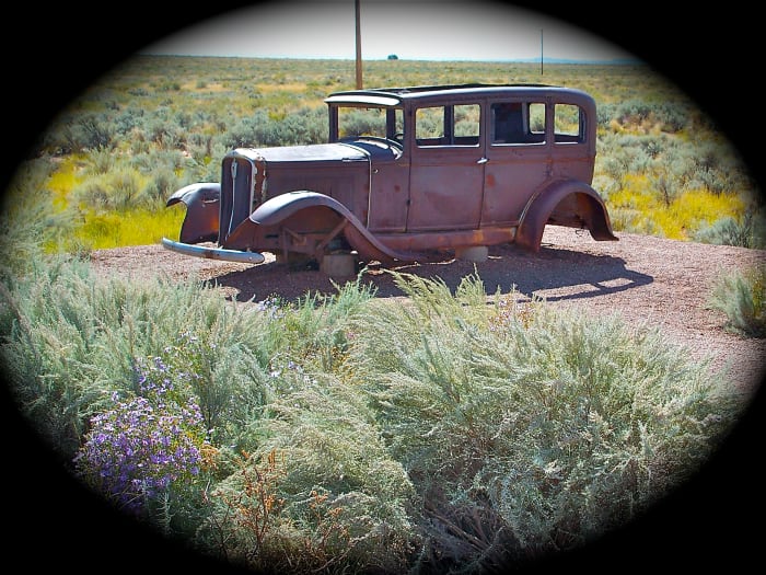 This car was abandoned along old Route 66 near the Petrified Forest in Arizona. They were probably collectors of petrified wood.