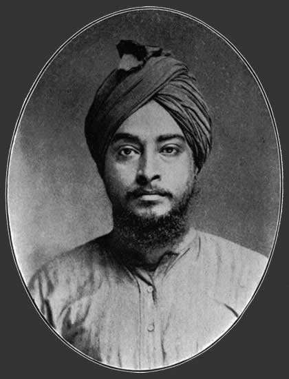 Yogananda's passport photo when he came to America. He shaved his beard on the boat trip when he was told that Americans might accept long hair, and they might accept a beard, but not both!