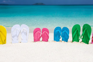 E coli produces a toxin that acts on the intestinal lining, this is the most common cause of travelers diarrhea.